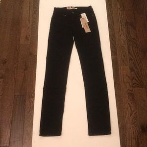 Levi’s black mid rise skinny jeans